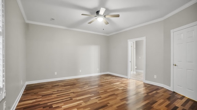 unfurnished room featuring dark hardwood / wood-style floors, ceiling fan, and ornamental molding