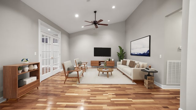 living room with high vaulted ceiling, light hardwood / wood-style flooring, and ceiling fan