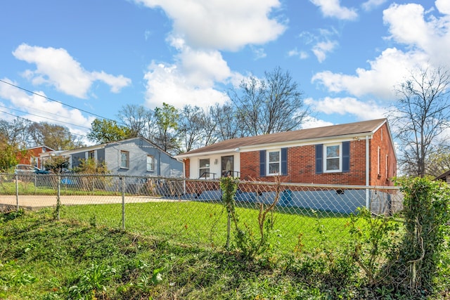 view of front of home with a front lawn