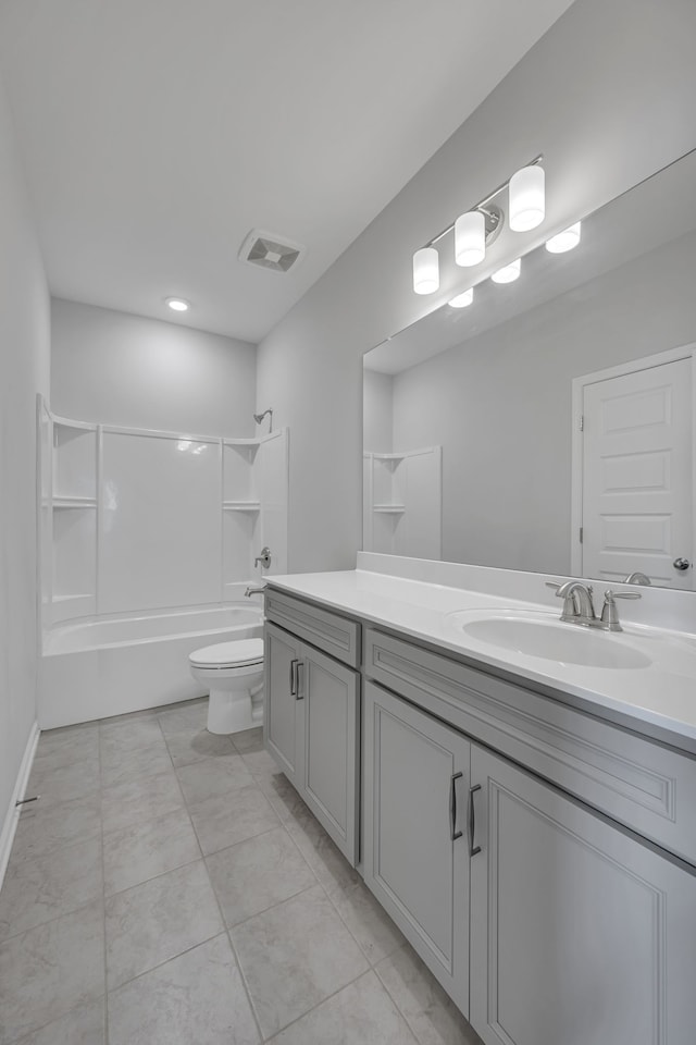 full bathroom with bathtub / shower combination, toilet, and vanity