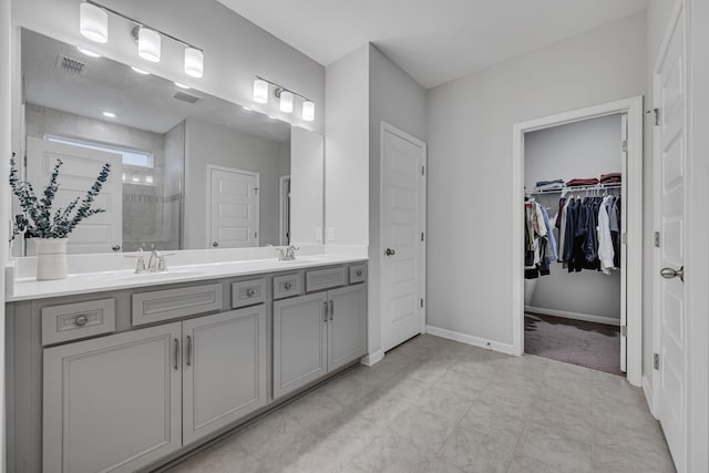 bathroom featuring vanity and walk in shower