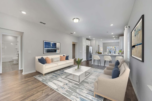 living room with wood-type flooring