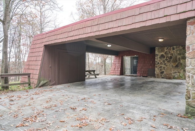 view of patio / terrace with a carport