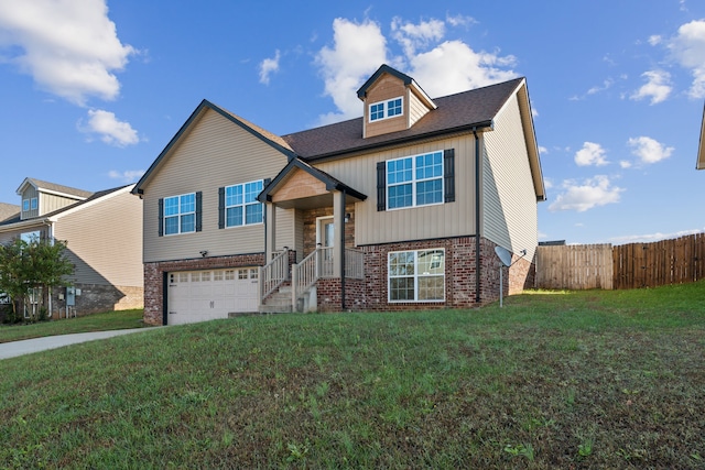 view of front facade with a front yard and a garage