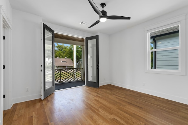 entryway featuring ceiling fan and wood-type flooring