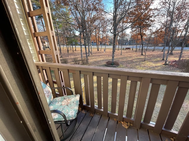 wooden deck with a trampoline