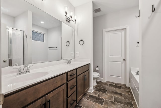 full bathroom with vanity, plus walk in shower, and toilet