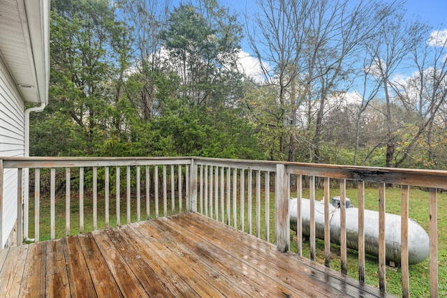 deck featuring a lawn