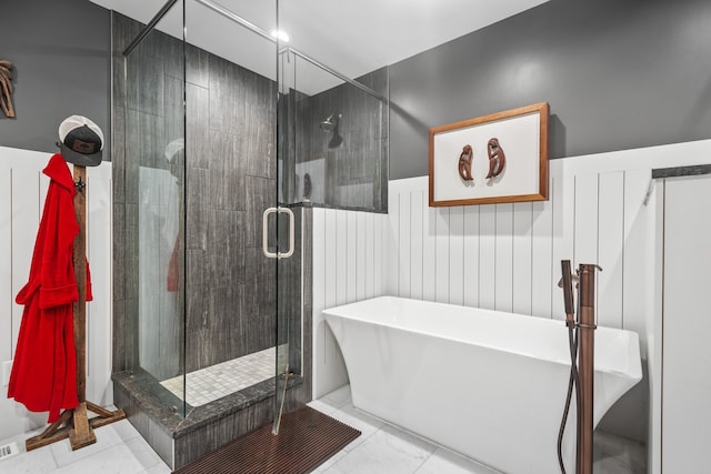 bathroom with independent shower and bath