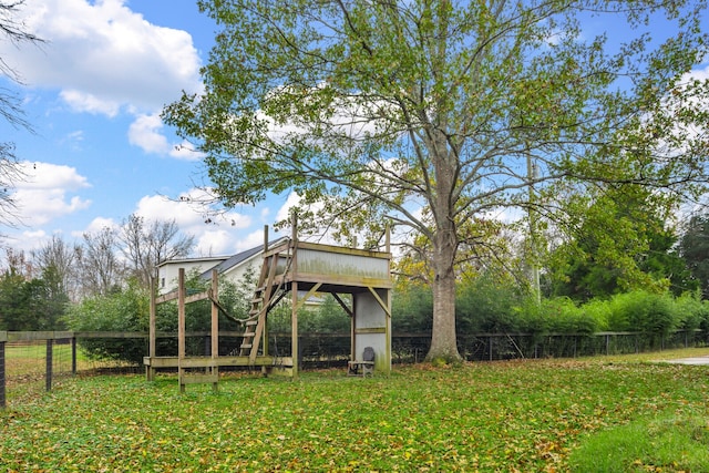 view of community with a yard