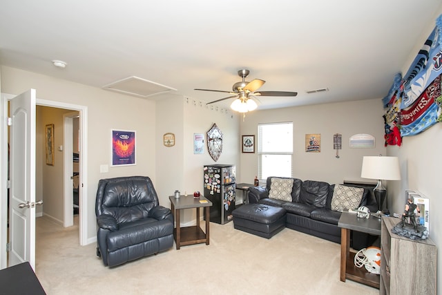 carpeted living room featuring ceiling fan