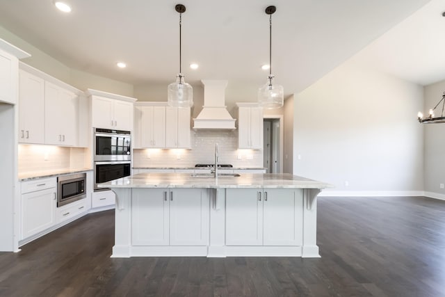 132 Aarons Cress Blvd, Hermitage, TN 37076 - kitchen with appliances with stainless steel finishes, premium range hood, dark wood-style flooring, decorative backsplash, and recessed lighting