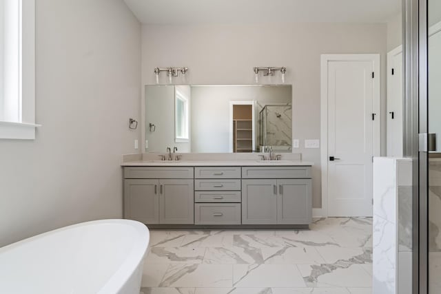 132 Aarons Cress Blvd, Hermitage, TN 37076 - full bath with double vanity, a freestanding bath, a stall shower, and marble look tiles