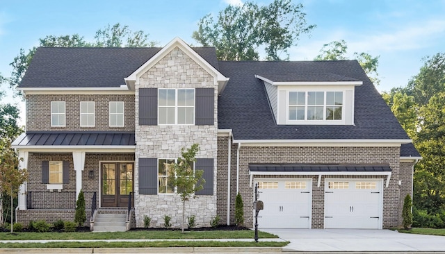 132 Aarons Cress Blvd, Hermitage, TN 37076 - view of front facade with stone siding, driveway, and a garage