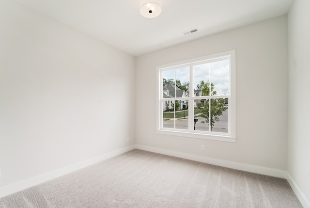 view of carpeted spare room