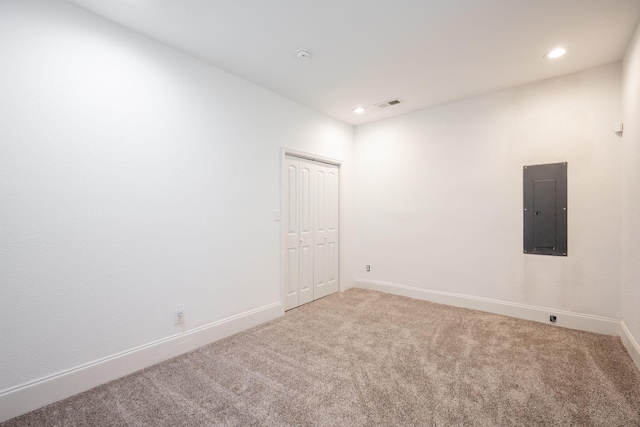 800 Tunnel Blvd, Chattanooga, TN 37406 - empty room with electric panel, carpet floors, baseboards, and recessed lighting