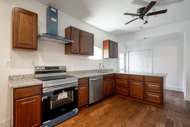 800 Tunnel Blvd, Chattanooga, TN 37406 - kitchen featuring appliances with stainless steel finishes, wall chimney exhaust hood, a sink, ceiling fan, and a peninsula