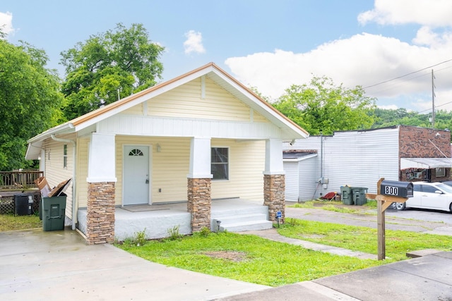 800 Tunnel Blvd, Chattanooga, TN 37406 - view of front facade featuring a porch, stone siding, and cooling unit