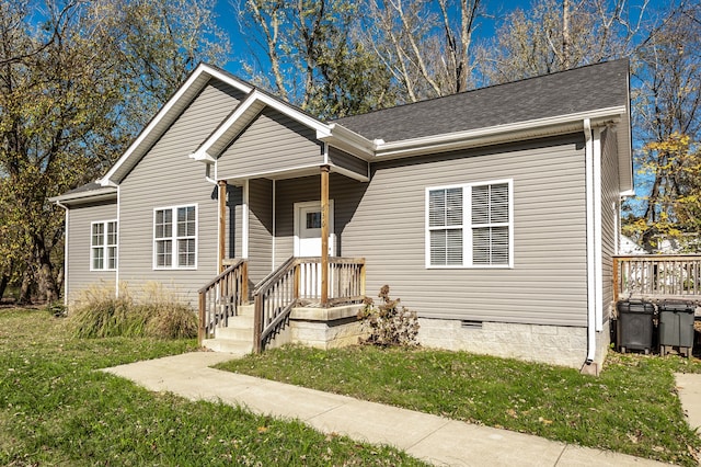 view of front facade with a front yard