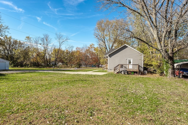 view of yard featuring a wooden deck