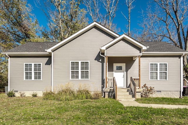 view of front facade with a front yard