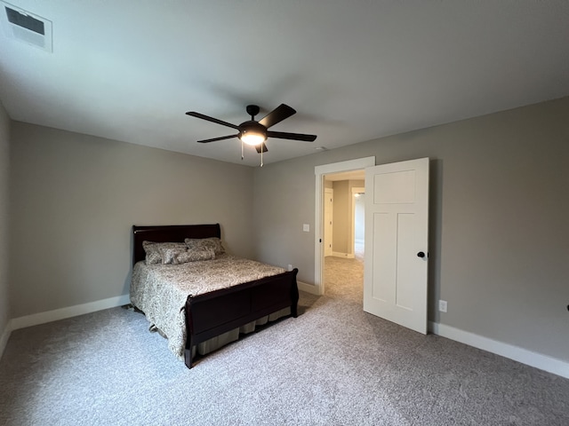 unfurnished bedroom with ceiling fan and carpet floors