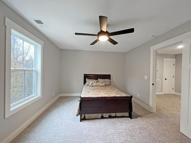731 Hogan Rd, Clarksville, TN 37043 - bedroom featuring light colored carpet, a ceiling fan, and baseboards