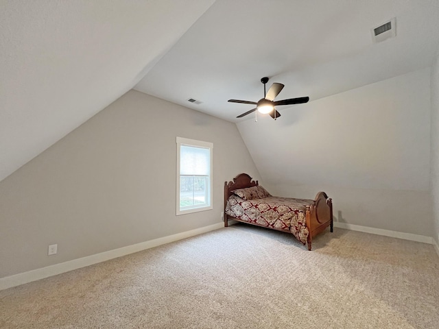 731 Hogan Rd, Clarksville, TN 37043 - carpeted bedroom with vaulted ceiling, baseboards, and ceiling fan