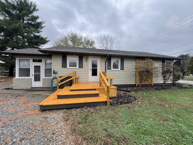 view of front of property featuring a wooden deck