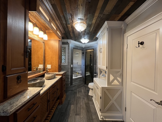 bathroom with hardwood / wood-style floors, toilet, wood ceiling, and crown molding