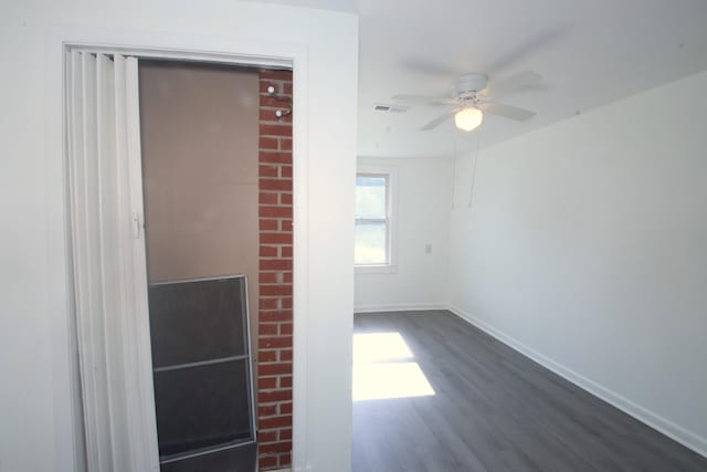 60 Riddle Rd, Shelbyville, TN 37160 - unfurnished living room with dark wood finished floors and a ceiling fan