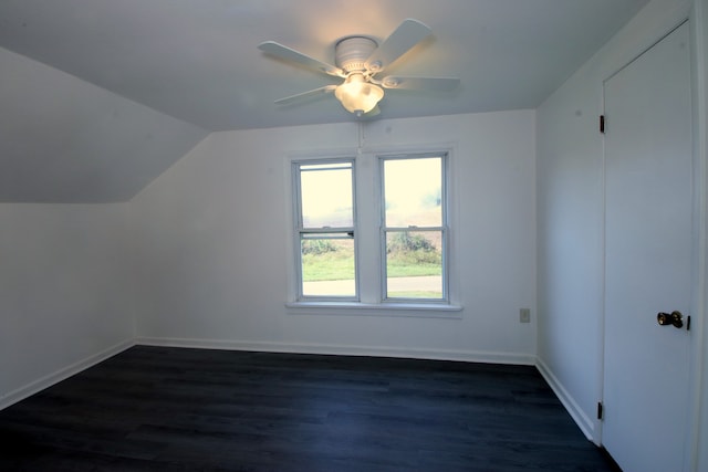 bonus room featuring vaulted ceiling, ceiling fan, and dark hardwood / wood-style floors