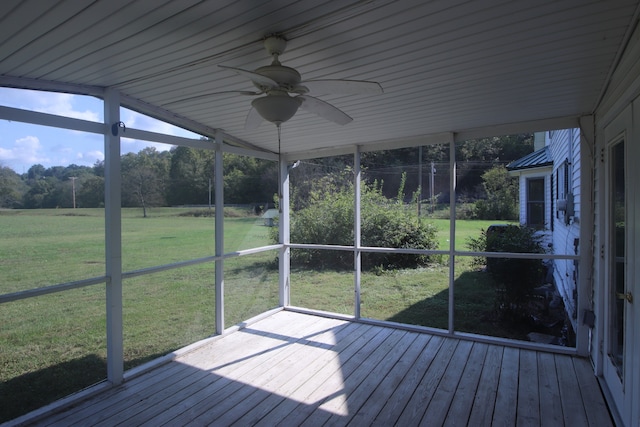 unfurnished sunroom with wooden ceiling, ceiling fan, and lofted ceiling