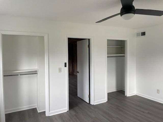 60 Riddle Rd, Shelbyville, TN 37160 - unfurnished bedroom featuring dark wood-style floors and ceiling fan