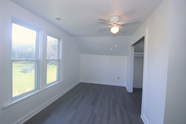 bonus room with dark hardwood / wood-style floors, ceiling fan, and lofted ceiling