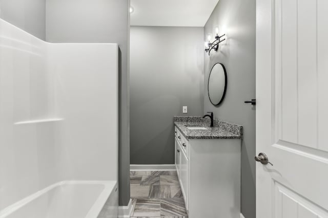 bathroom with vanity and tile patterned flooring