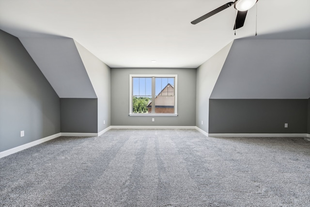 bonus room featuring light carpet and lofted ceiling