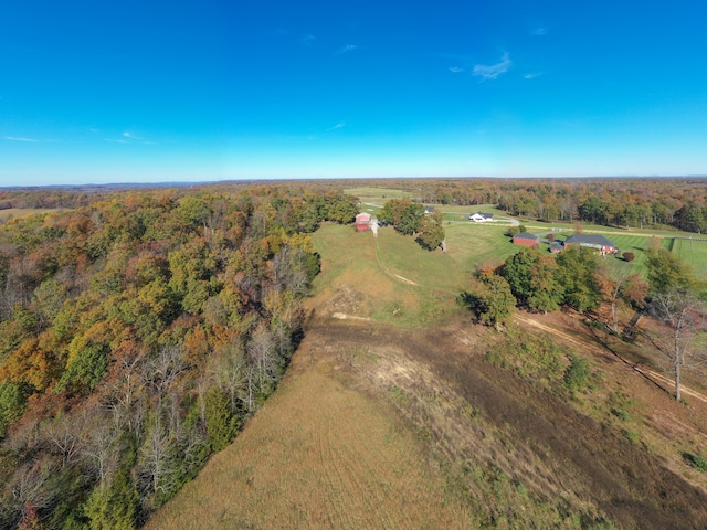 birds eye view of property with a rural view