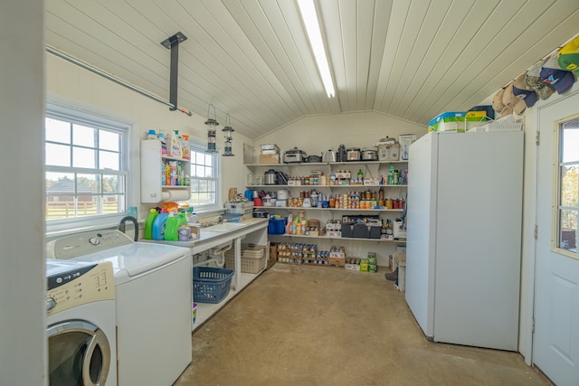 laundry area with independent washer and dryer