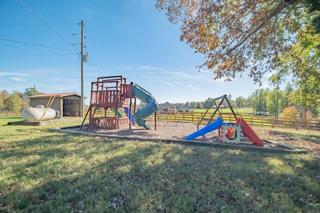 view of playground featuring a lawn