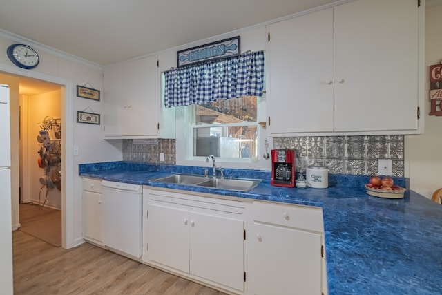 kitchen featuring decorative backsplash, ornamental molding, white dishwasher, sink, and white cabinets