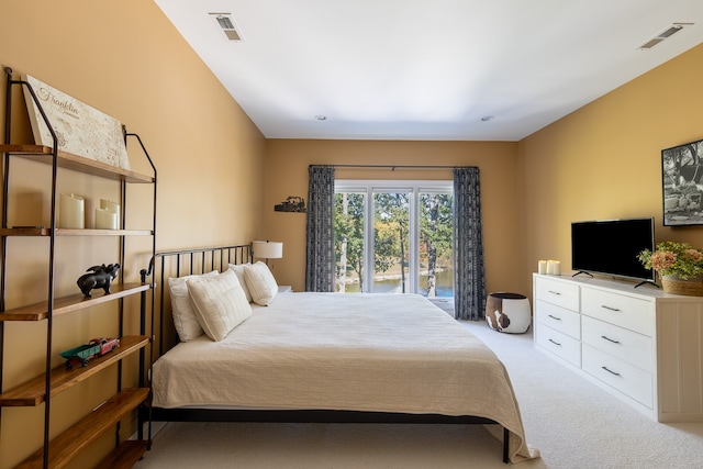 carpeted bedroom with visible vents