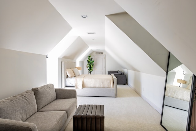 bedroom featuring carpet floors, visible vents, vaulted ceiling, and baseboards