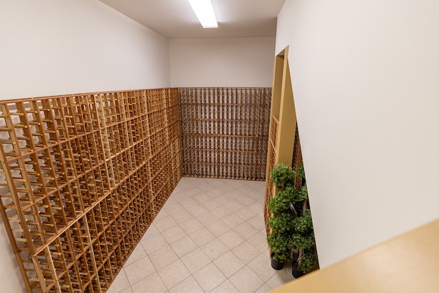 wine room featuring tile patterned floors