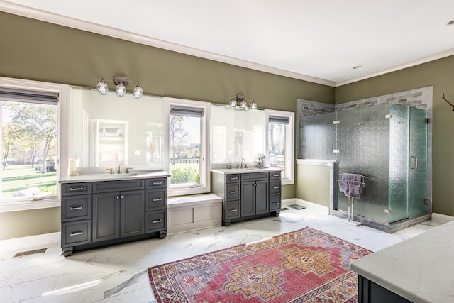 full bathroom featuring plenty of natural light, a stall shower, baseboards, and ornamental molding