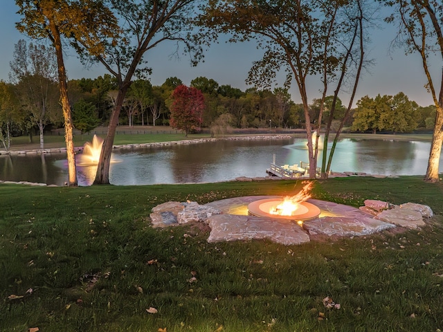 view of water feature featuring a fire pit