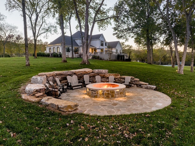 view of patio / terrace with a fire pit