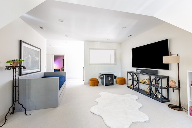 carpeted living area with baseboards, visible vents, and recessed lighting