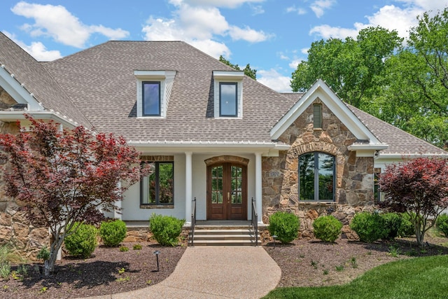 1702 Old Hillsboro Rd, Franklin, TN 37069 - view of front of house featuring stone siding, a shingled roof, a porch, and french doors