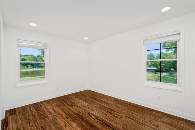 1702 Old Hillsboro Rd, Franklin, TN 37069 - spare room featuring healthy amount of natural light, dark wood-style floors, and recessed lighting